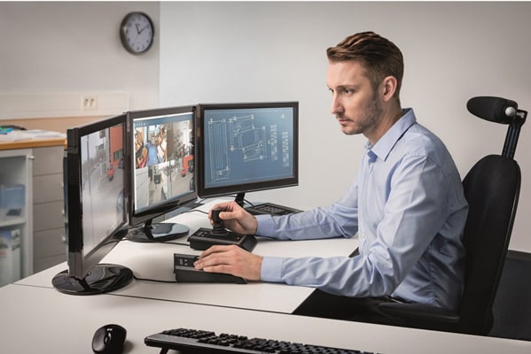 Man using AXIS camera Station