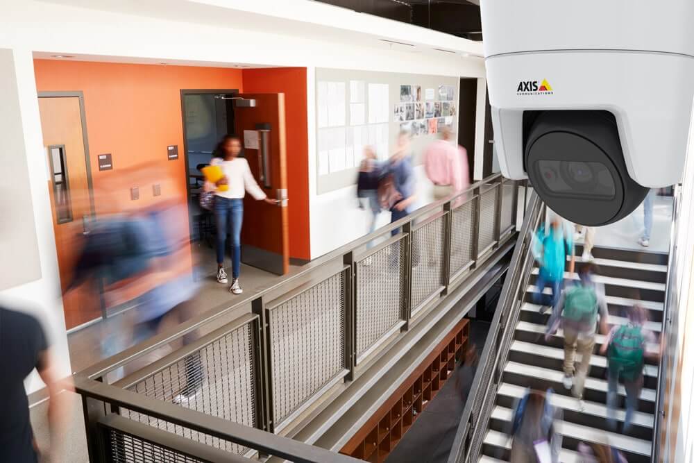 Security camera in school hallway